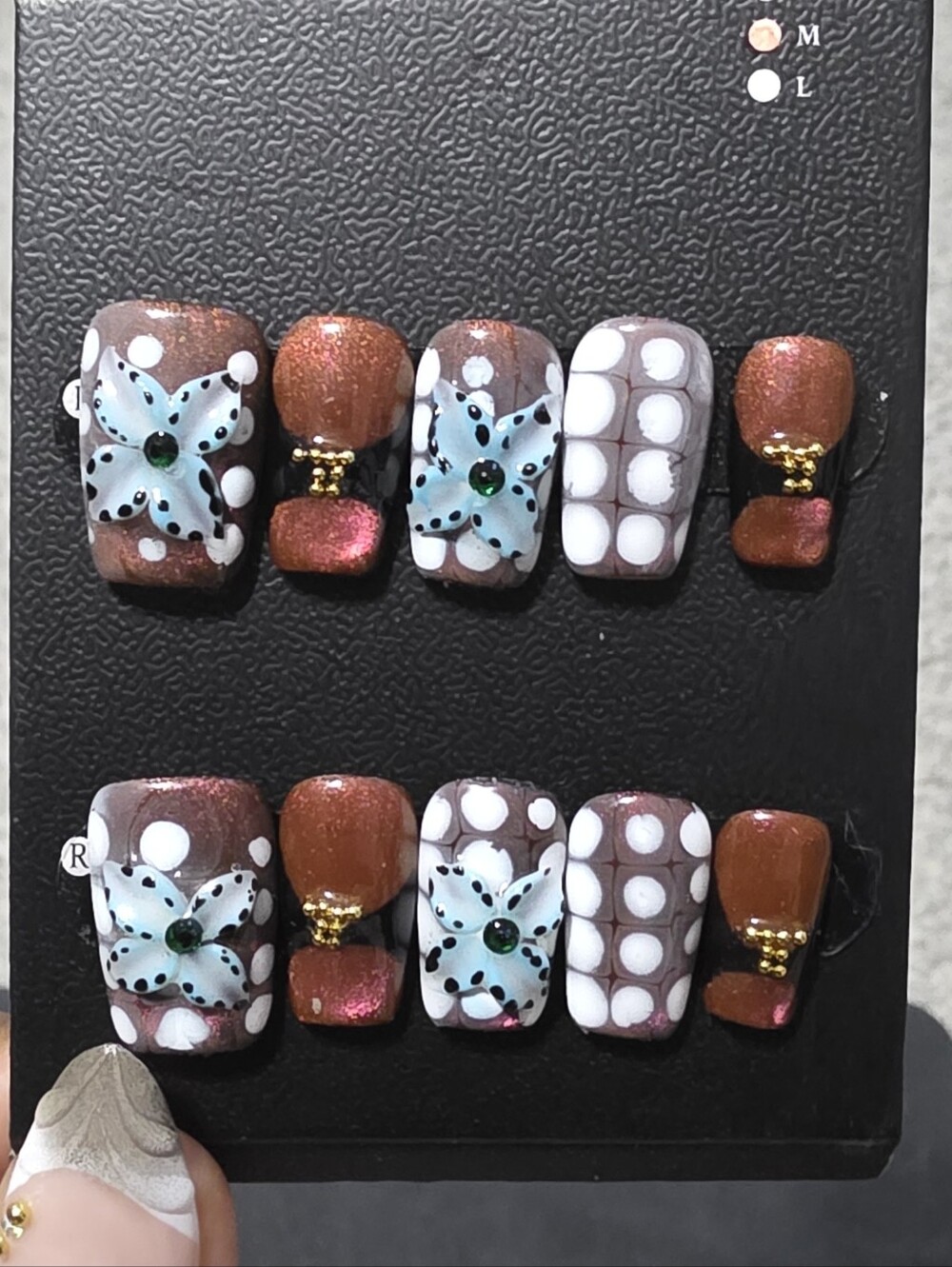 Hand-Painted Blue Flower Press-On Nails with Copper Shimmer